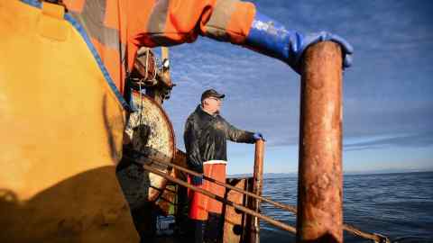 Crewman Gordon Mowbray works fishing for prawns on the fishing trawler 'Scotia Star' in the North Sea off the east coast of Scotland on December 10, 2018. - In the small fishing village of Pittenweem, in southeast Scotland, uncertainty over Brexit is looming large on the North Sea horizon as British Prime Minister Theresa May's divorce deal flounders. (Photo by Andy Buchanan / AFP)        (Photo credit should read ANDY BUCHANAN/AFP/Getty Images)