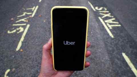 FILE PHOTO: The Uber application is seen on a mobile phone in London, Britain, September 14, 2018. REUTERS/Hannah McKay/File Photo