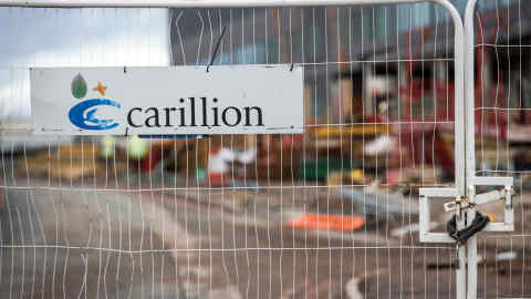 A padlock sits on fencing surrounding the Midland Metropolitan Hospital construction site, operated by Carillion Plc, in Smethwick, U.K., on Thursday, Jan. 18, 2018. The Wolverhampton, central England-based company filed for liquidation on Monday after failing in last-ditch efforts to get support from lenders and the government. Photographer: James Beck/Bloomberg