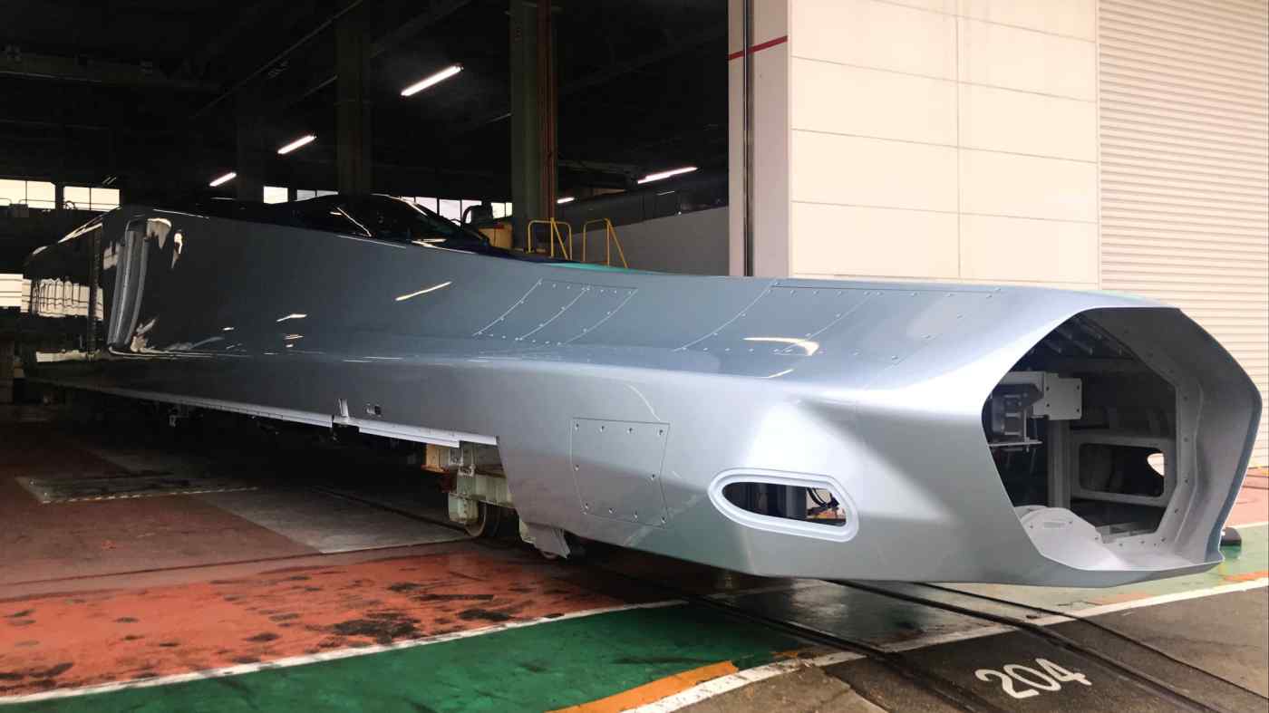 A prototype nose section, still incomplete, of a next-generation shinkasen bullet train capable of traveling at 360 km per hour. (Photo by Keigo Iwamoto)