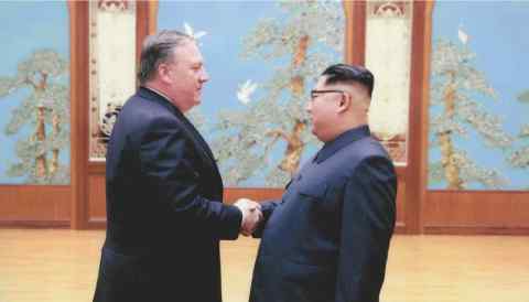 U.S. Secretary of State Mike Pompeo, left, and North Korean leader Kim Jong Un, right, met in Pyongyang this year.