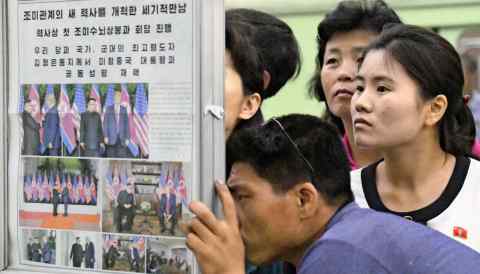 Residents of Pyongyang read up on Kim Jong Un's summit with U.S. President Donald Trump.