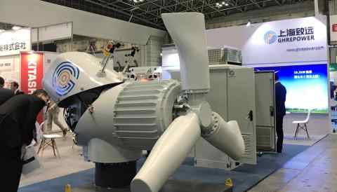 China's Shanghai Ghrepower shows off a new turbine at a Tokyo exhibition. The company aims to raise its count of turbines in Japan 10-fold. (Photo by Nana Shibata)