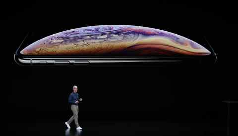 Tim Cook, CEO of Apple, speaks about the iPhone XS and XS Max at an Apple product launch event at the Steve Jobs Theater in Cupertino, California, on Sept. 12.