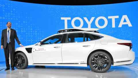 Toyota unveils the TRI-P4 automated driving test vehicle in Las Vegas on Jan. 7. (Photo by Tomoki Mera)