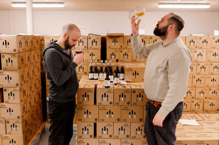 Head brewer Ross Adams, left, and manager Peter Grady test the quality of their latest batch of Tynt Meadow