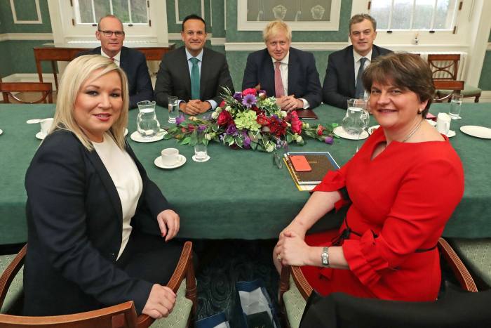 Michelle O’Neill, left, as deputy first minister in 2020, with then first minister Arlene Foster of the DUP at a meeting with Ireland’s former taoiseach Leo Varadkar (background, second from left) and UK prime minister Boris Johnson