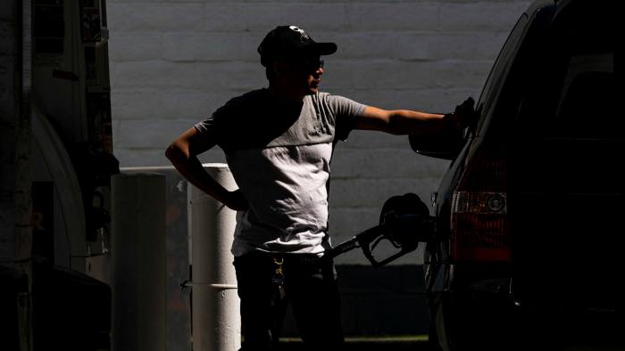 A customer fuels a vehicle at a service station in San Francisco