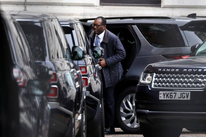 Kwasi Kwarteng exits a car on Downing Street in October 