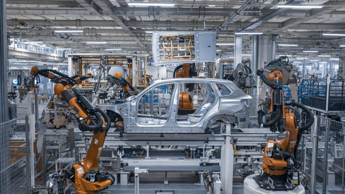 Car shell surrounded by robots at a factory belonging to BMW’s joint venture with China’s Brilliance Automotive in Dadong, Shenyang