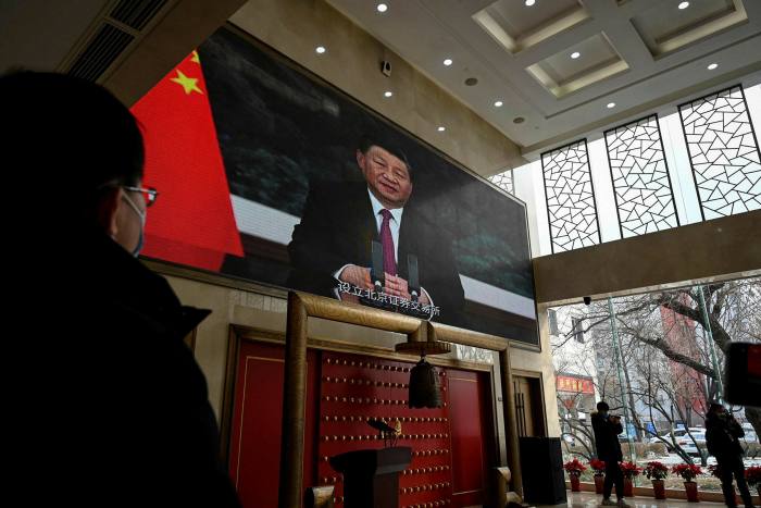 China’s President Xi Jinping is seen on a video clip during a media tour of Beijing Stock Exchange in February