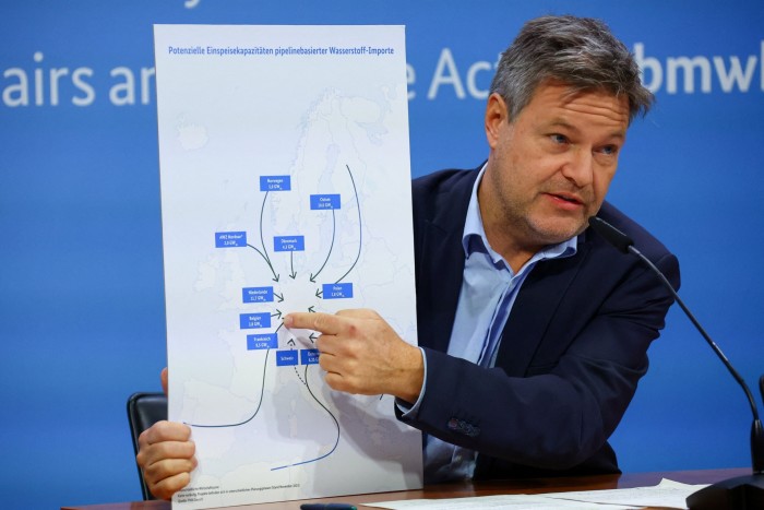 Economy minister Robert Habeck holds a graphic at a press conference
