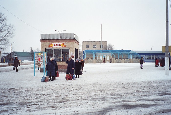 Women wait for the local bus in Bakhmut, winter 2011