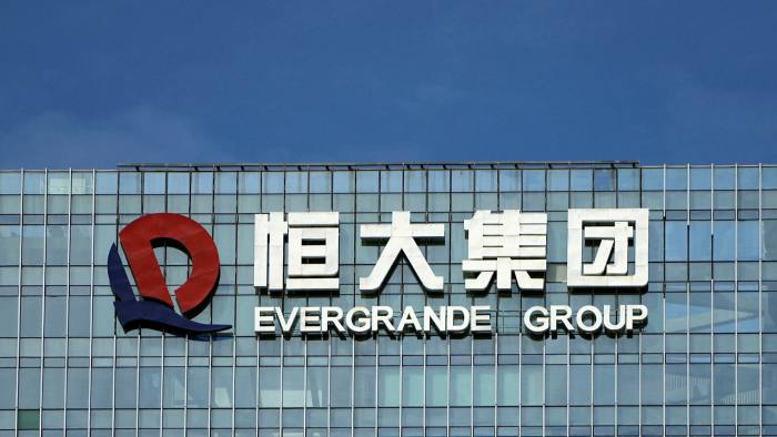 company logo is seen on the headquarters of China Evergrande Group in Shenzhen, Guangdong