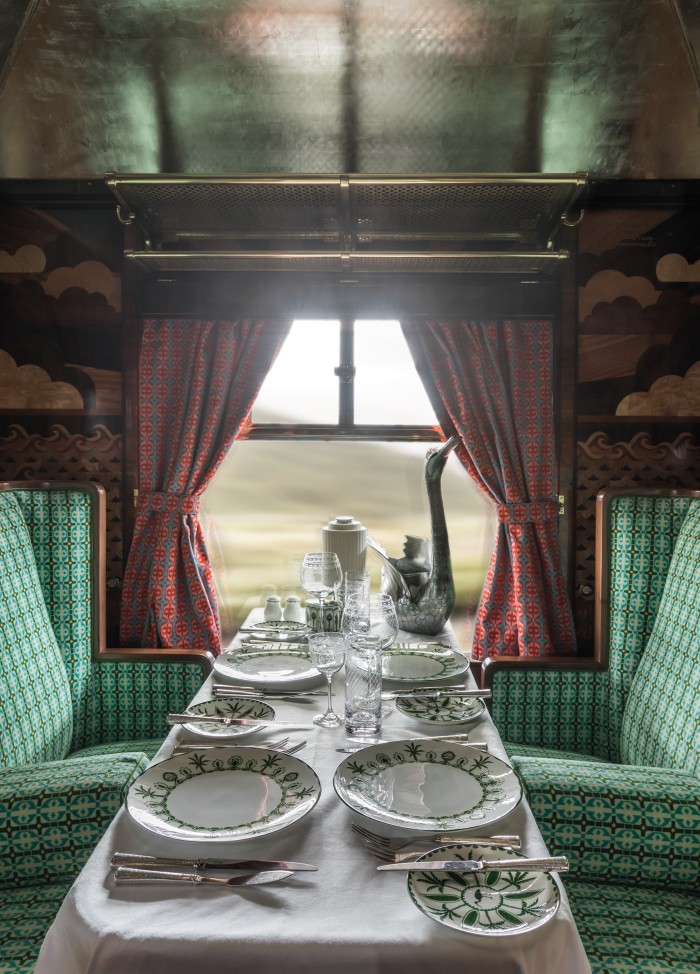 The train is replete with silver leaf and extravagant textiles and ornate marquetry 