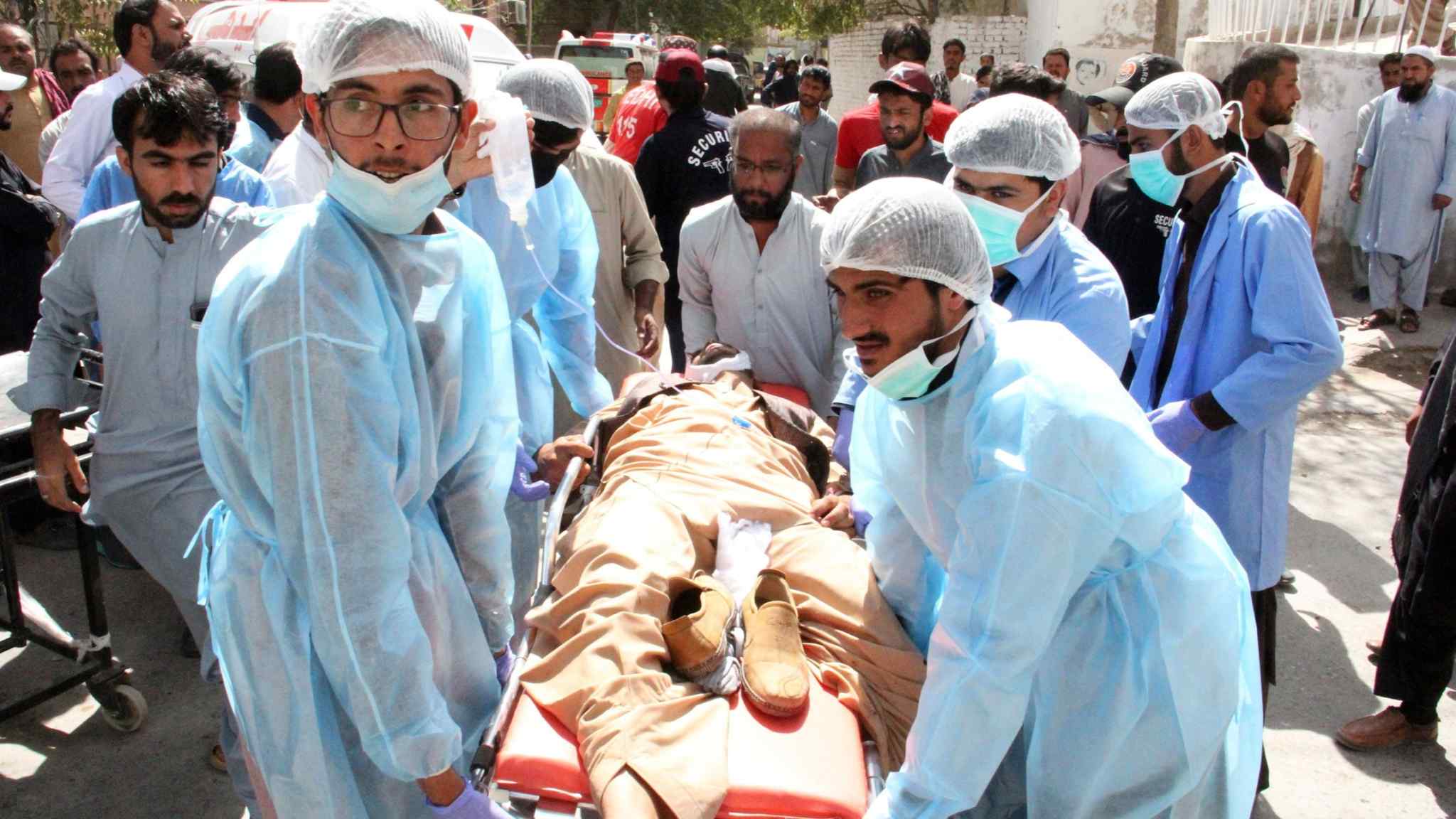 Suicide bombers kill more than 50 people in Pakistan attacks