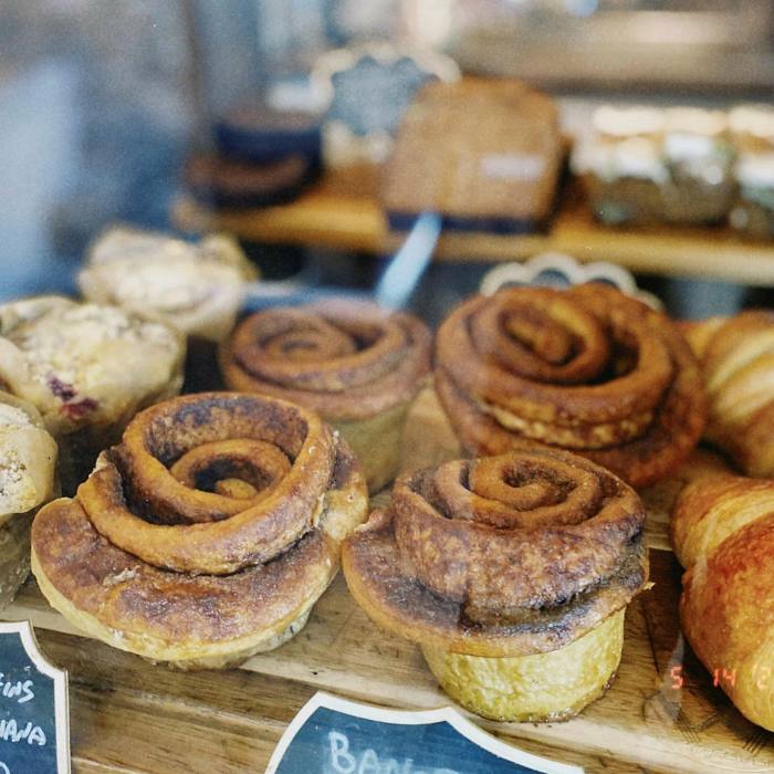 Vegan cinnamon buns alongside other pastries at Soul