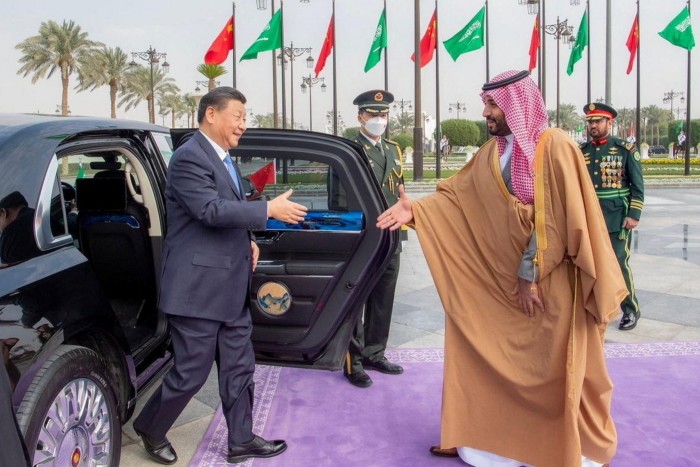 Saudi Arabia’s crown prince Mohammed bin Salman, right, welcomes Xi to Riyadh in December 