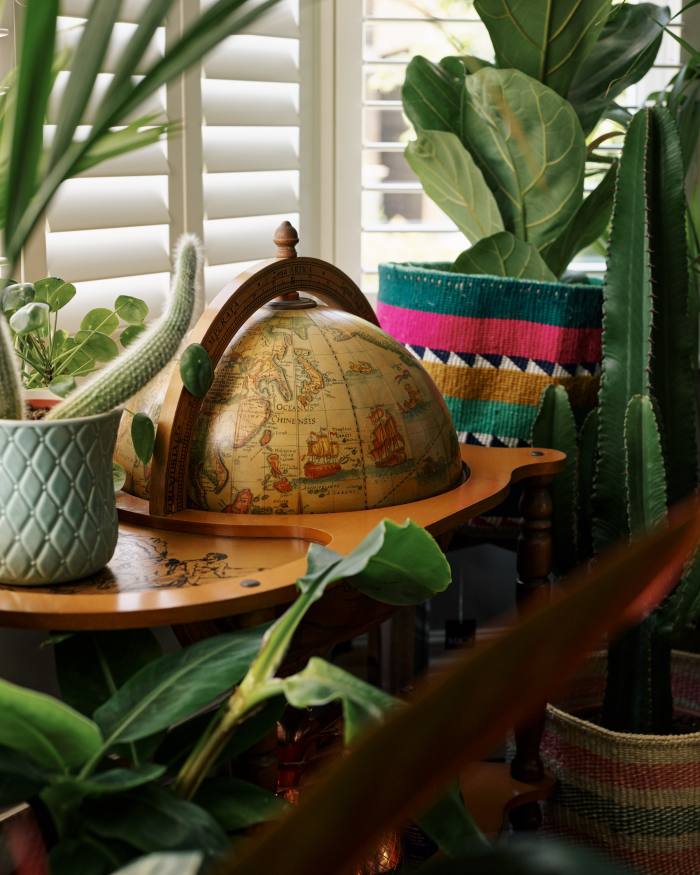 The globe drinks cabinet, surrounded by planters from Boma