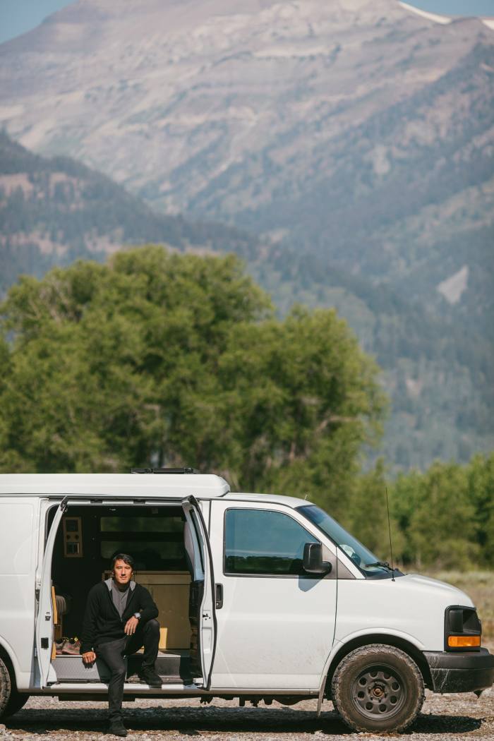 Chin in his van, parked in the lot where he is building a new house in Jackson, Wyoming