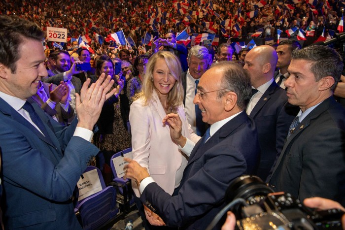 Eric Zemmour stands in front of Marion Maréchal, Marine Le Pen’s niece and a youthful star of the right who has joined his presidential campaign