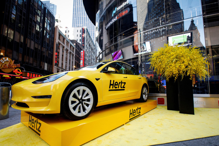A Hertz Tesla electric car on display during the Hertz Corporation IPO at the Nasdaq Market site in Times Square in New York City in November 2021