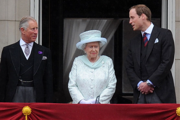 The Queen at Buckingham Palace with Prince Charles and Prince William in 2012. As she grew older, she made way for younger family members to take up some of her public duties