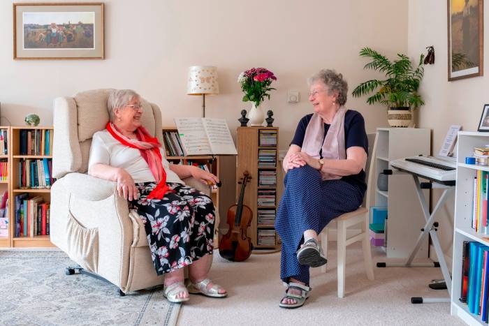 Maggie Redding (left) and Sylvia Daly at home in ‘LGBT+ affirmative’ New Larchwood, Brighton