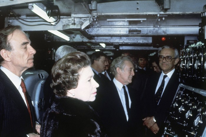 Rupert Murdoch and Queen Elizabeth II inspect printing operations for The Times newspaper to mark the publication’s bicentenary on March 1 1985