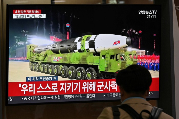 A South Korean TV news broadcast of a military parade commemorating the 75th anniversary of North Korea’s ruling Workers’ party held in Pyongyang, at a railway station in Seoul last October