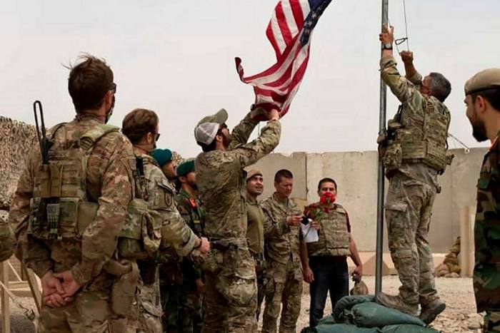 A handover ceremony from the US army to the Afghan national army, in Helmand province, south Afghanistan, in May