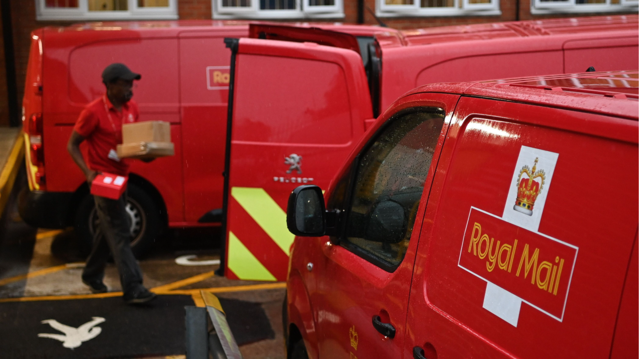 Live news updates: UK postal workers to strike for 19 days in next two months
