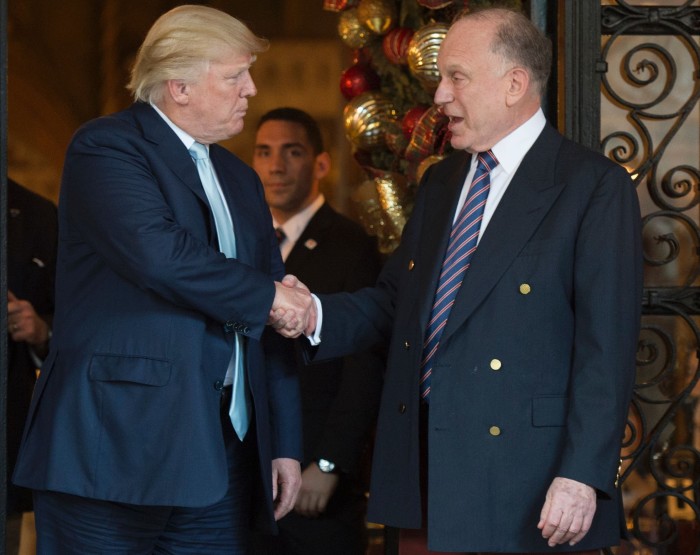 Then president-elect Donald Trump shakes hands with Ronald Lauder after a meeting at Mar-a-Lago in Palm Beach, Florida