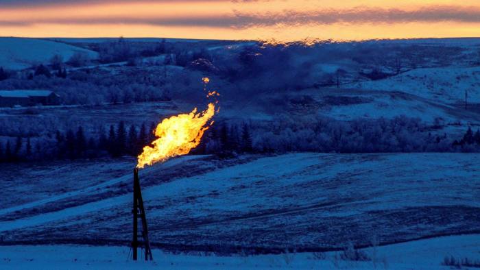 A natural gas flare burns at an oil well in North Dakota