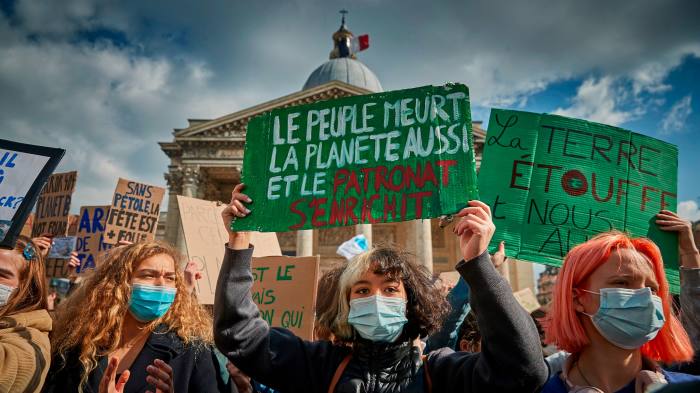 Climate change protesters gather in front of the Pantheon in Paris