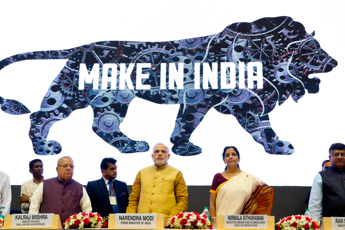 Indian prime minister Narendra Modi unveils the lion logo of his ‘Make in India’ initiative in New Delhi, in 2014