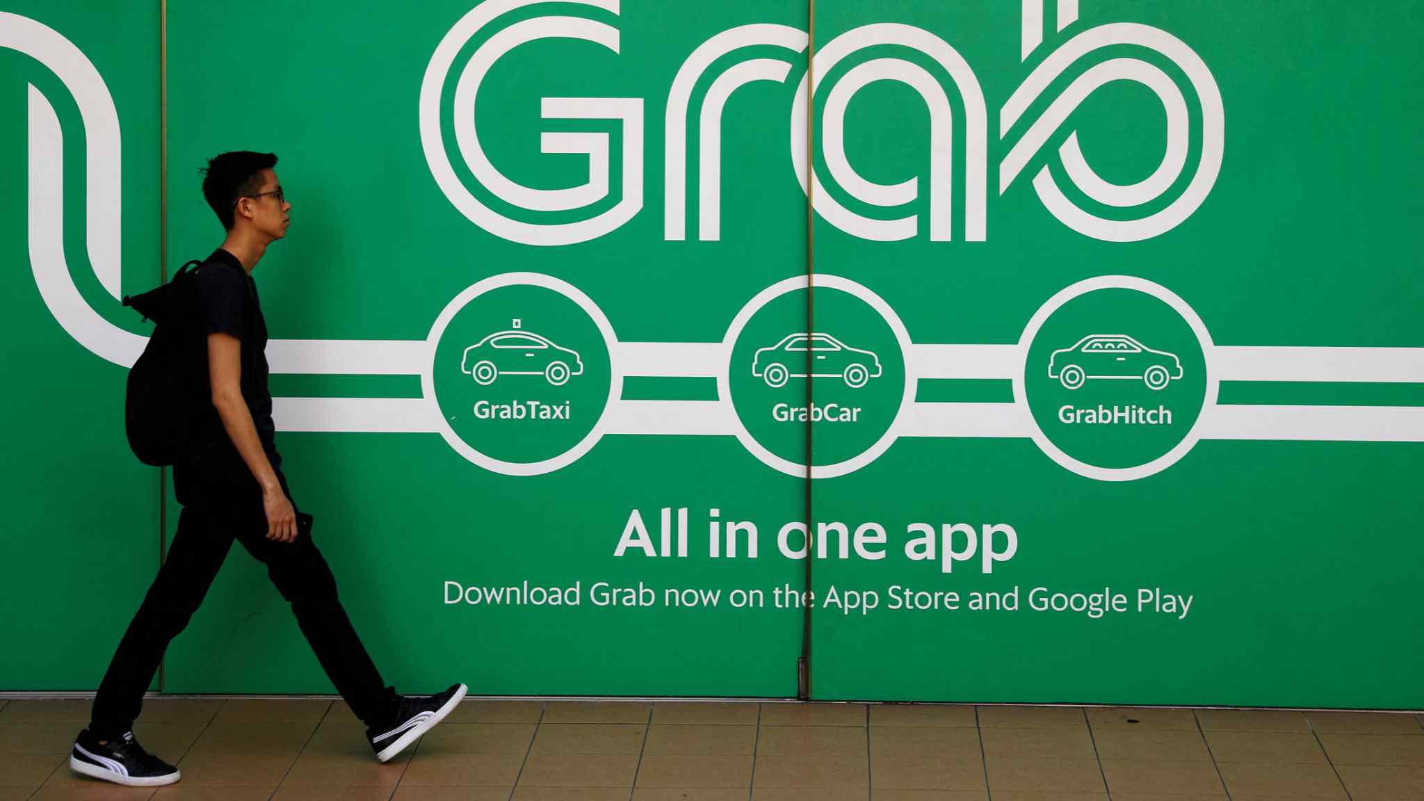 SoftBank-backed Grab targets first profit by 2024