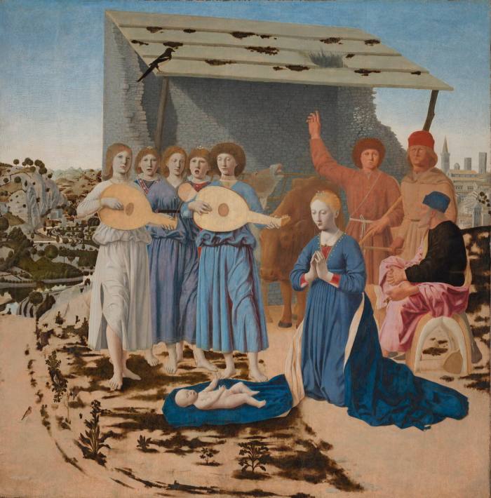 Oil painting of a woman in a blue dress kneeling in the desert to a baby on a blue cloak. A band plays its lutes nearby