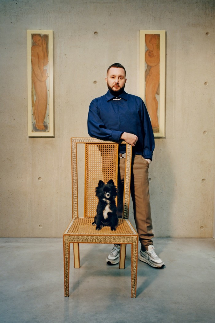 Kim Jones, artistic director of Dior Homme and artistic director of Fendi womenswear and couture, at home in London with his Pomeranian named Cookie, one of his four dogs