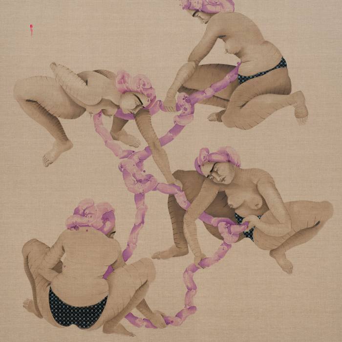 Four near-nude women squat, all holding what looks like a pink-colored trail of intestines