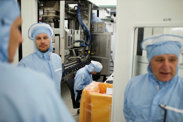 Workers at ASML, which produces the most advanced lithography machines used in the chipmaking process
