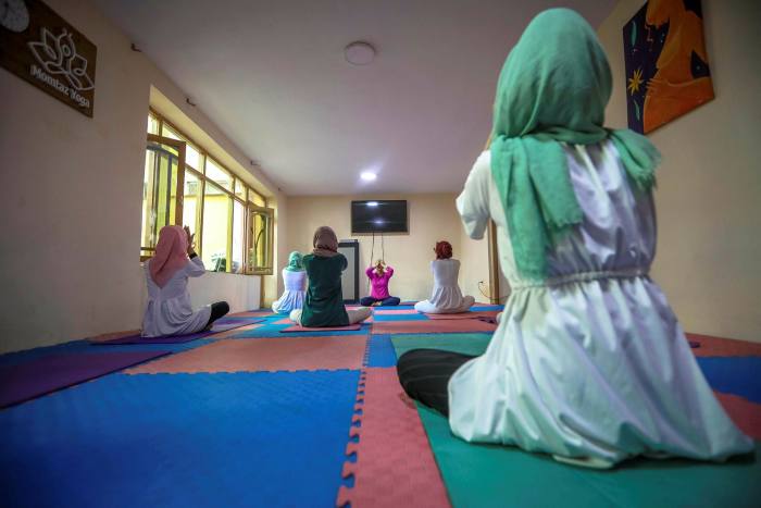 Women at a yoga class in Kabul