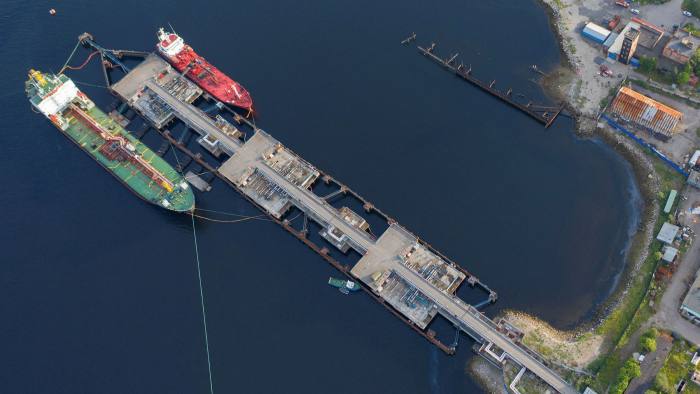 Tankers are loaded at the oil terminal in Murmansk