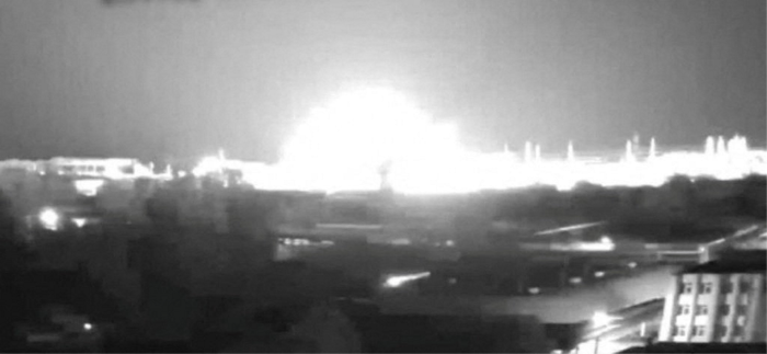 A CCTV camera image, purportedly showing a Russian military attack on the Pivdnoukrensk nuclear power plant