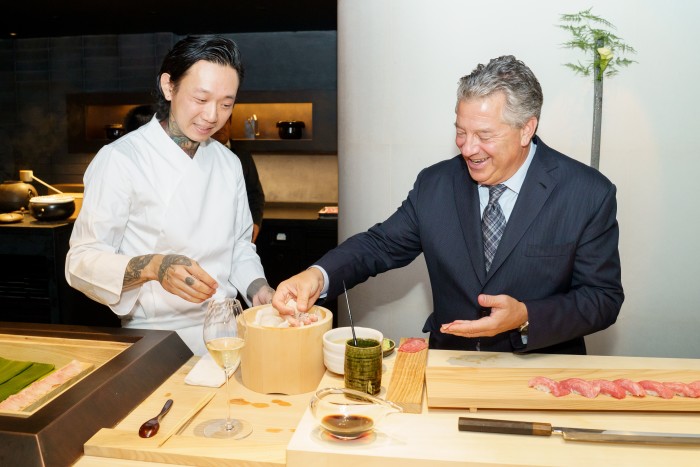Sushi Chef Wayne Cheng, left, with SL Green CEO Marc Holliday