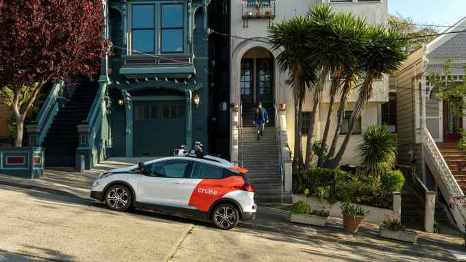 Cruise car parked on an inclined street. Cruise is a start-up backed by General Motors that is trialling autonomous vehicles in San Francisco, California.