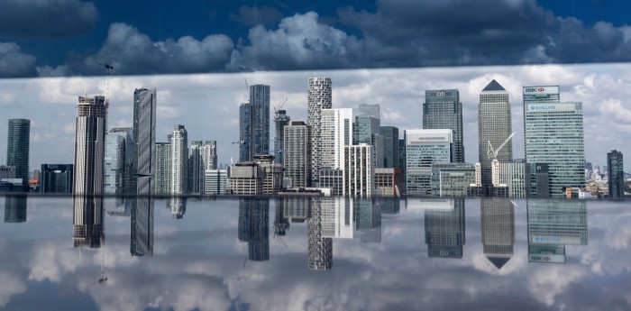 Canary Wharf skyline and reflection in the Thames