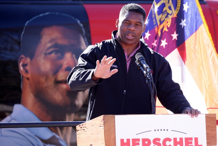 Herschel Walker speaks during a campaign rally