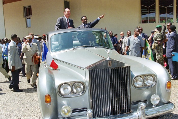 Jacques Chirac and Gabonese President Omar Bongo tour Libreville in an official Rolls-Royce during the two-day visit of the French President to Gabon in July 1996