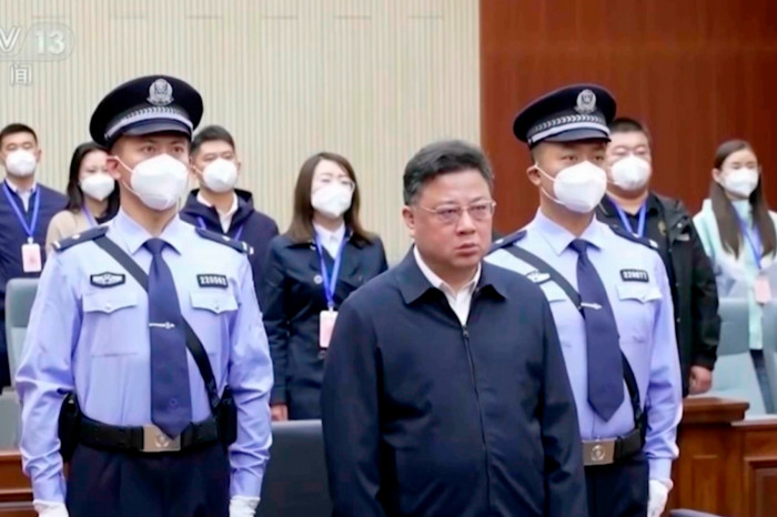 Former top official Sun Lijun in court last month on charges of bribery and arms possession